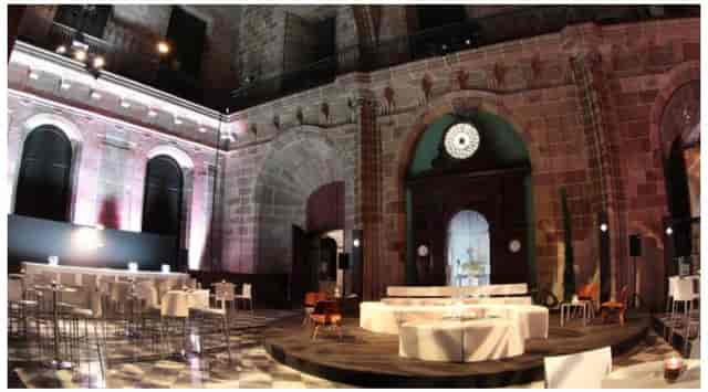 Historic La Llotja de Mar venue with stone architecture for corporate networking event.