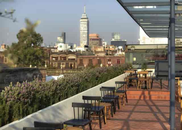 Rooftop terrace at Circulo Mexicano with skyline backdrop for networking events and cocktail hours.
