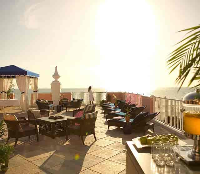 Del Sol Room at The Don CeSar with lounge seating for executive retreats and sunset receptions.