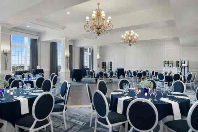 Del Sol Room at The Don CeSar with elegant chandeliers for corporate galas and luxury weddings.