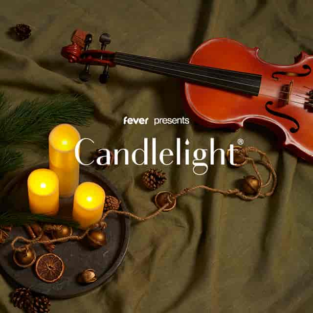 Candlelight concert at Jardín de Eventos Hermitage Ajusco with atmospheric lighting.