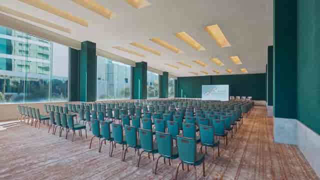 Theater-style conference room at Grand Fiesta Americana with natural light for corporate events.