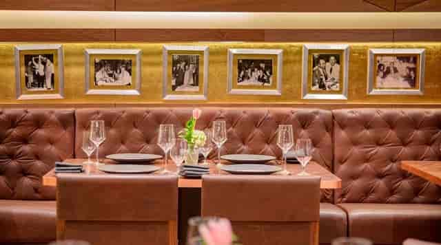 Alfredo Di Roma private dining room with leather banquettes for corporate dinner and VIP meetings.
