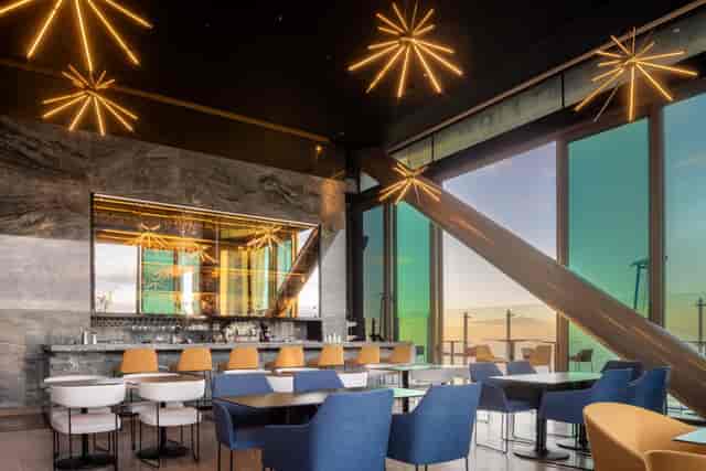 Terraza rooftop lounge with floor-to-ceiling windows for networking receptions and VIP events.