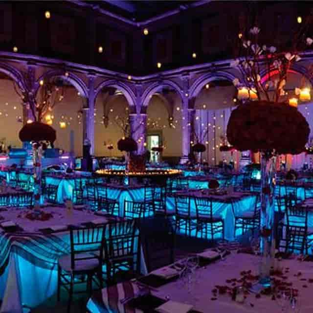 BENIU function room with dramatic uplighting and vaulted architecture for gala or corporate events.