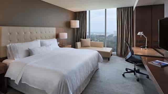 Jazmin in a premium Westin Santa Fe guest room with ergonomic workspace for VIP event housing.