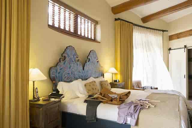 New Mexico Room suite at La Fonda with regional decor for luxury corporate events and VIP travel.