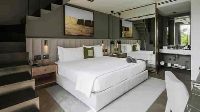Contemporary VIP guest room at Brick Hotel for executive corporate incentive travel.