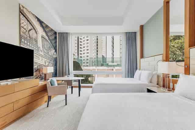 Caspio double-queen hotel room at Live Aqua Mexico City, perfect for conference and business travel.