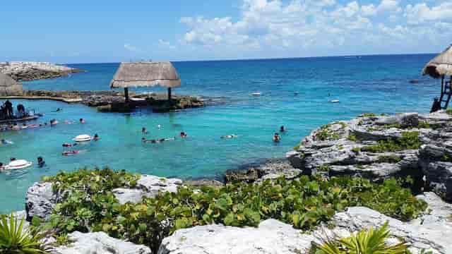 Xcaret Park amusement site, lush jungle scenery, ideal for corporate retreats and incentive travel.