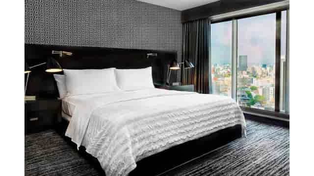 Modern Siqueiros Room at Le Méridien Mexico City with cityscape view for VIP conference delegates.