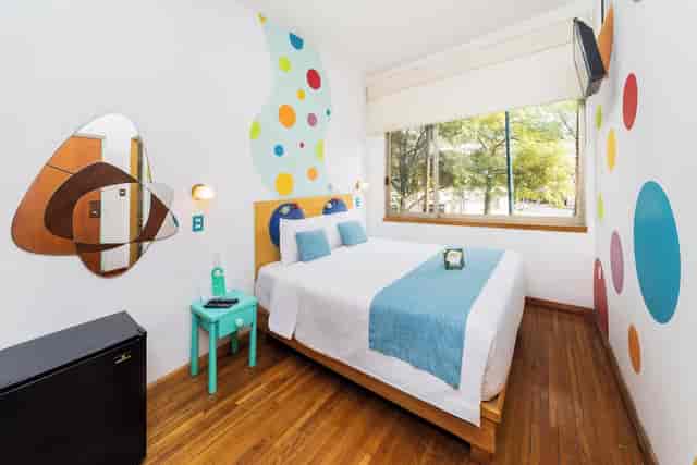 Economy guest room at Casa Anzures for budget travel and event lodging.