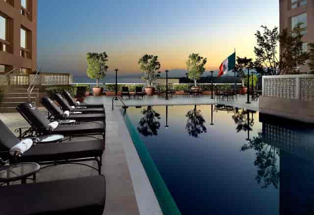 Rooftop hotel pool venue for exclusive corporate receptions and sunset cocktail events.