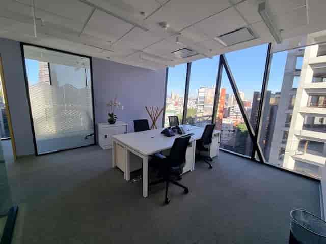 Modern breakout meeting room at Spaces Torre Concreta for professional coworking or office use.