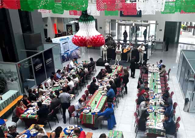 Corporate luncheon at German Centre Mexico with banquet seating and festive Mexican decor.