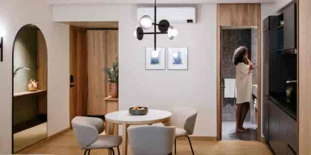 Luxury hotel suite in Colima 71 with versatile work table for executive bleisure and networking.