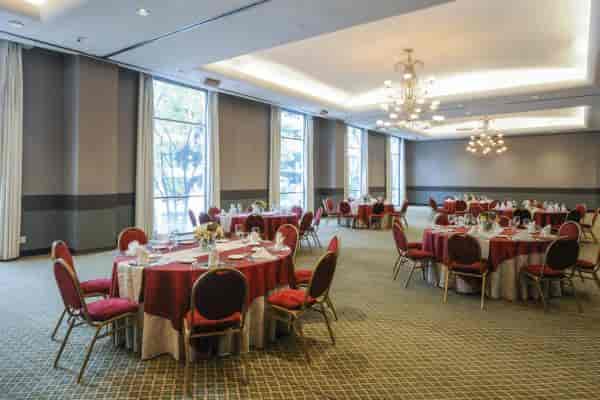BelAir Unique hotel banquet room with chandeliers for gala dinner or corporate event.