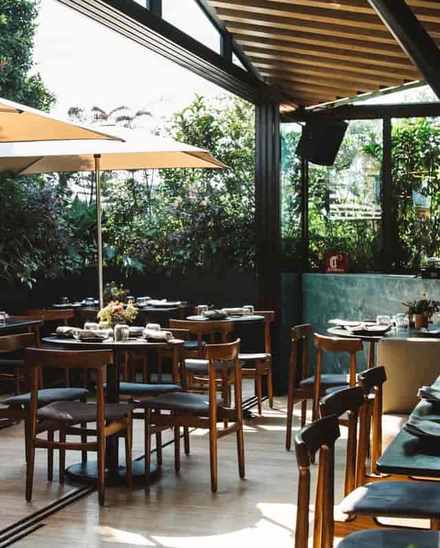 Madre Roof bar featuring natural decor for corporate luncheons and VIP networking events.