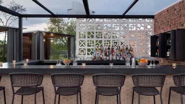 XKINA Rooftop bar, elegant outdoor setting for networking receptions and corporate cocktail hours.