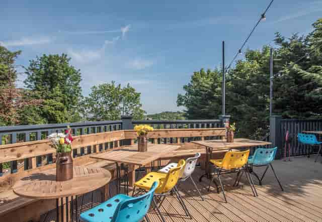 The Garden in The Faber Fox: vibrant outdoor venue for casual meetings and events.