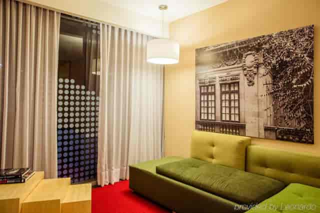 Modern Fiesta Inn meeting room with comfortable lounge seating for corporate strategy events.