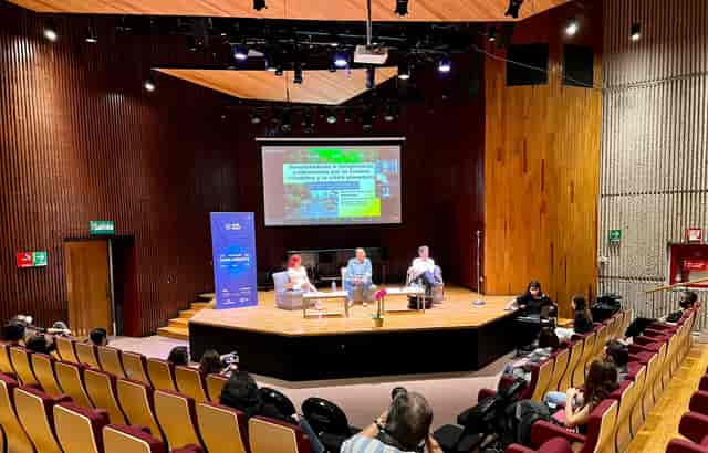 Panel discussion at Sala Carlos Chávez auditorium for professional events and conferences.