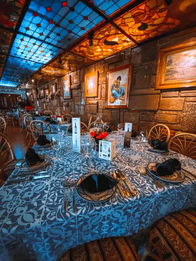 Rustic function room at Antigua Hacienda de Tlalpan with stone walls for private event dining.