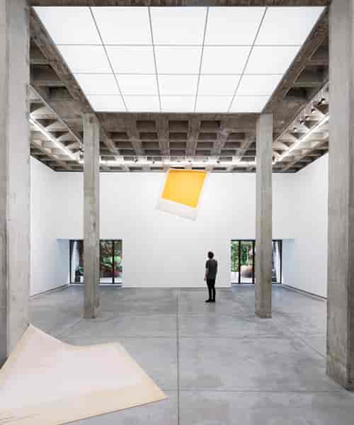 Industrial art gallery venue with high ceilings for minimalist product launches and activations.