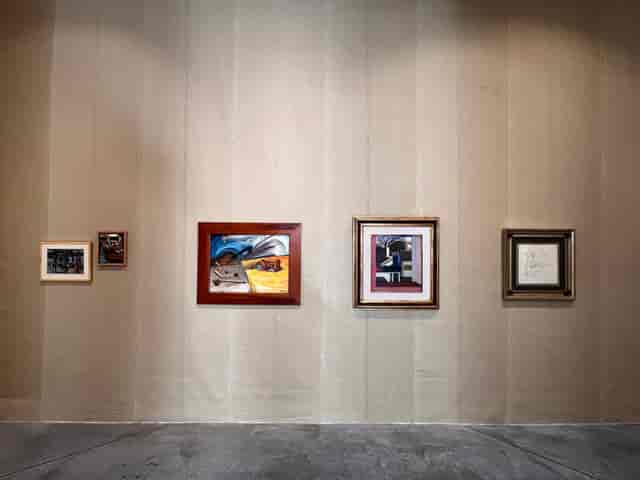 Industrial art gallery venue with lighting design for corporate events and exhibitions.