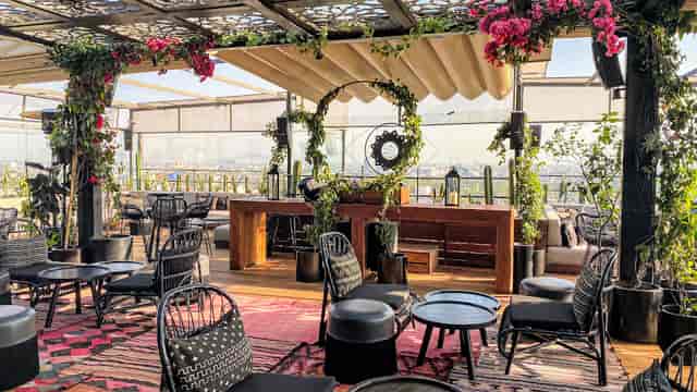 Maison Mexico Roma rooftop venue with lounge seating for corporate mixers and social gatherings.