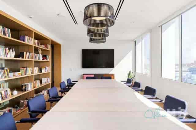 Boardroom at Insurgentes Sur 1079: Professional meeting space with AV screen for corporate events.