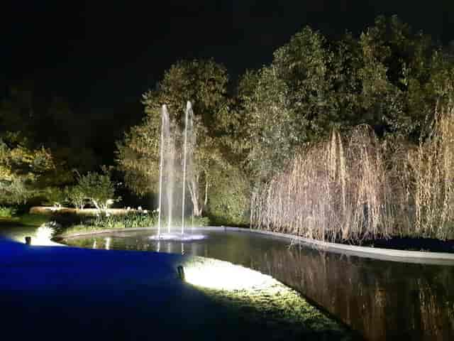 Lounge Los Cedros with water features and uplighting for evening wedding receptions and events.