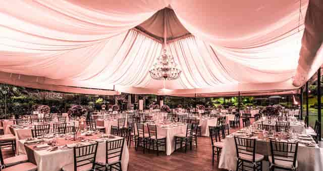 Crystal chandelier in elegant marquee gala and wedding function room at Grupo Foresta.