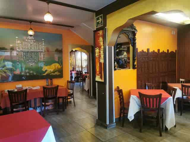 Intimate restaurant dining room at Centenario 107 for post-conference dinners and small events.