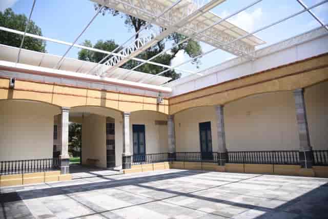 Art museum courtyard with canopy for upscale cocktail hours and networking events.