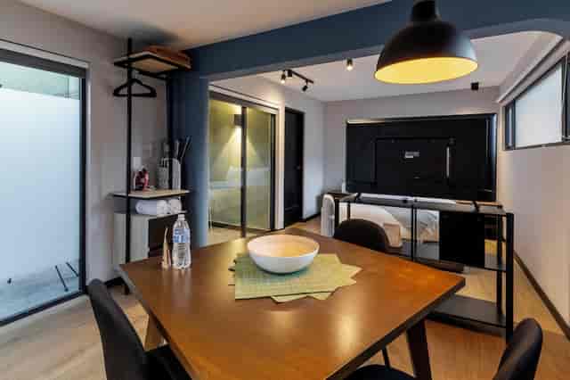 Modern breakout suite with meeting table for small-group business off-sites and hybrid work.