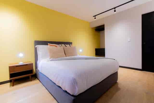 Modern 2BR condo in Capitalia Condesa with city skyline view for business conference or retreat.