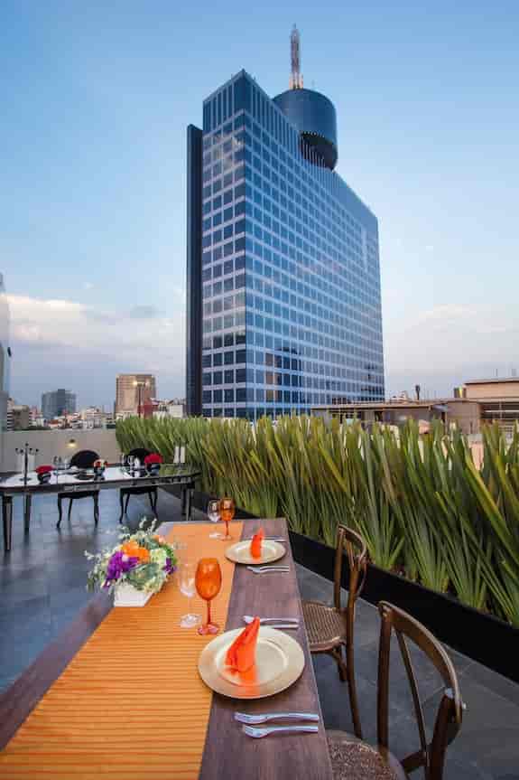 Modern rooftop restaurant at ISAAYA Hotel for corporate dinners and VIP networking events.
