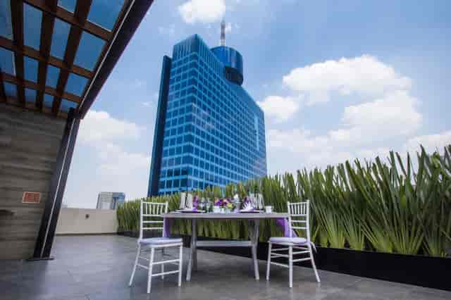 ISAAYA Hotel Boutique rooftop restaurant: chic urban dining venue for private corporate events.