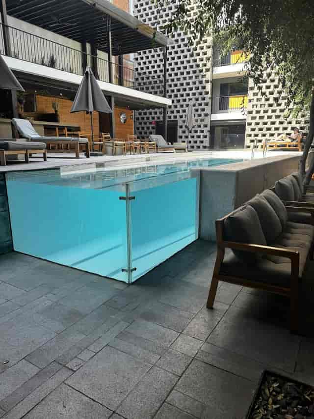 Outdoor hotel library breakout area for sophisticated corporate networking events.