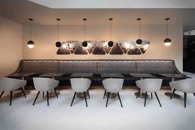 Contemporary banquette seating in Red Oak Craft Bar, ideal for networking and corporate events.