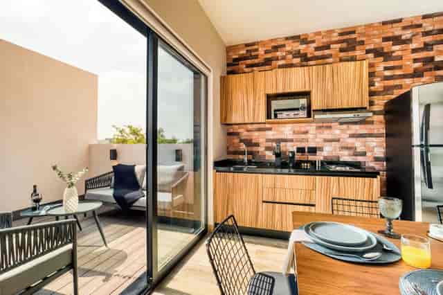 ULIV Roma Norte VIP suite with kitchenette for executive networking and private events.
