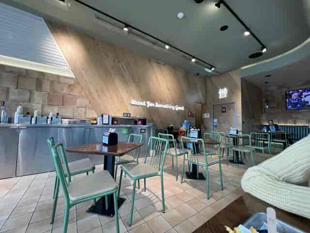 Modern Shake Shack Miyana interior for casual team huddle or networking event.