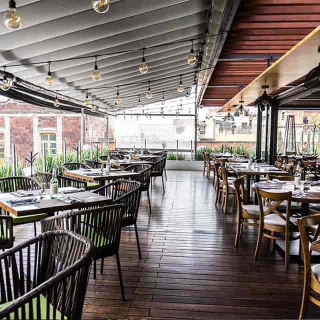 Open-air terrace at Domingo Santo Hotel for corporate mixer and networking dinner events.