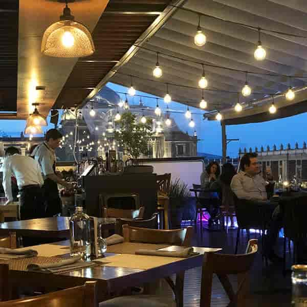 Bistro-lit outdoor reception at Domingo Santo Hotel Boutique, ideal for elegant evening events.