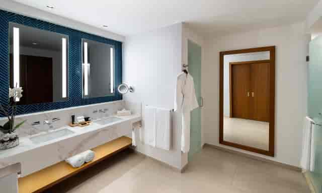 Luxury Hard Rock Hotel Punta Cana board room bathroom with dual vanities for corporate events.