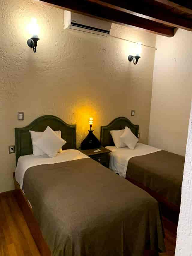 Small Room at Mesón de la Merced: budget hotel room for corporate event attendee housing.