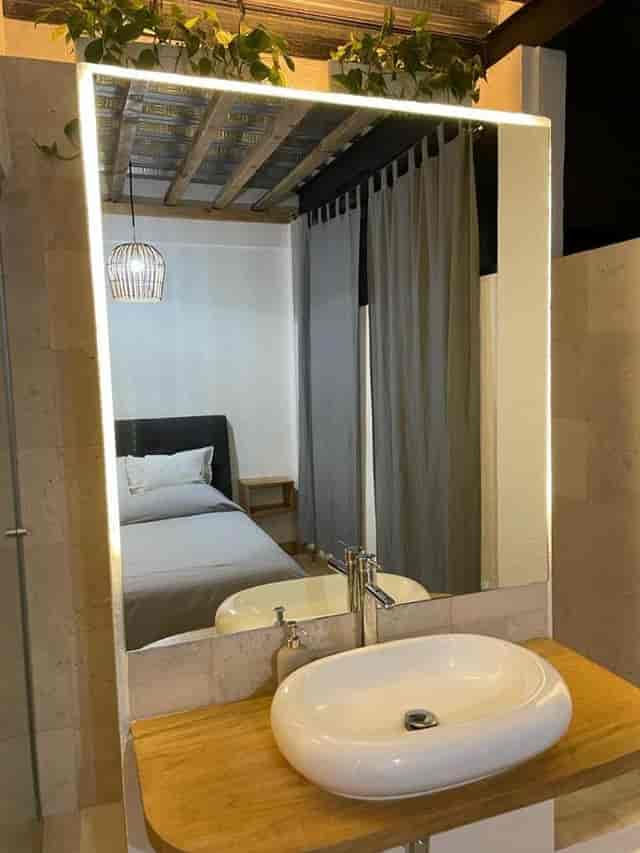 Minimalist hotel room in Coyoacan, Mexico City: boutique business accommodation.