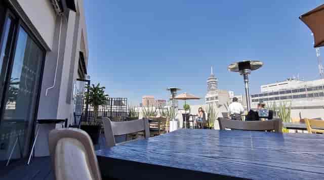 Buffet MX rooftop venue with heaters, perfect for upscale networking events and cocktail hours.