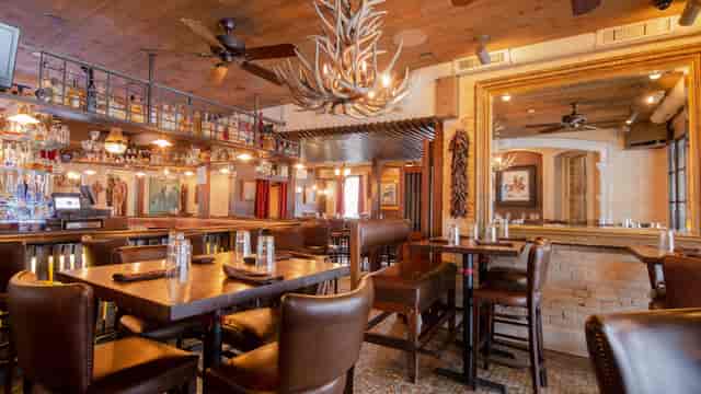 Rustic private dining room in Geronimo for corporate events and VIP dinners.